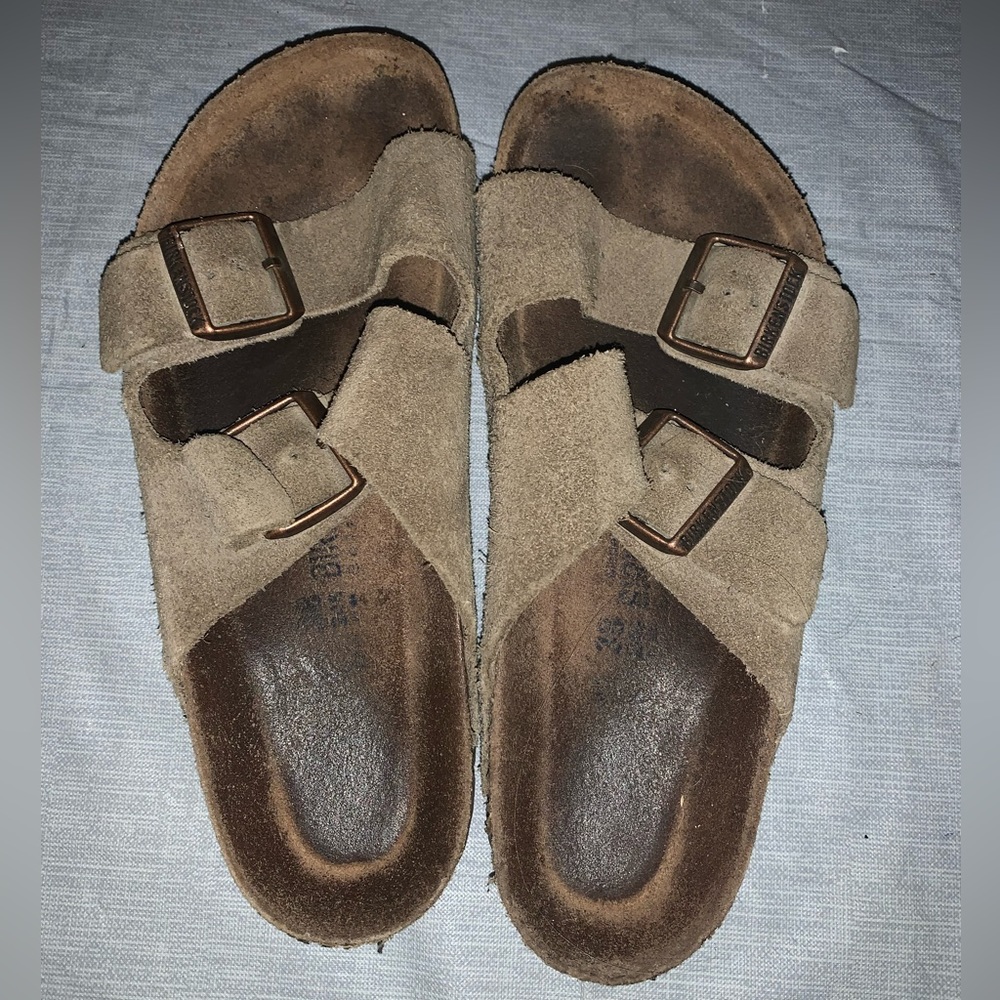 Birkenstocks!! They have been worn but they are still in good condition!